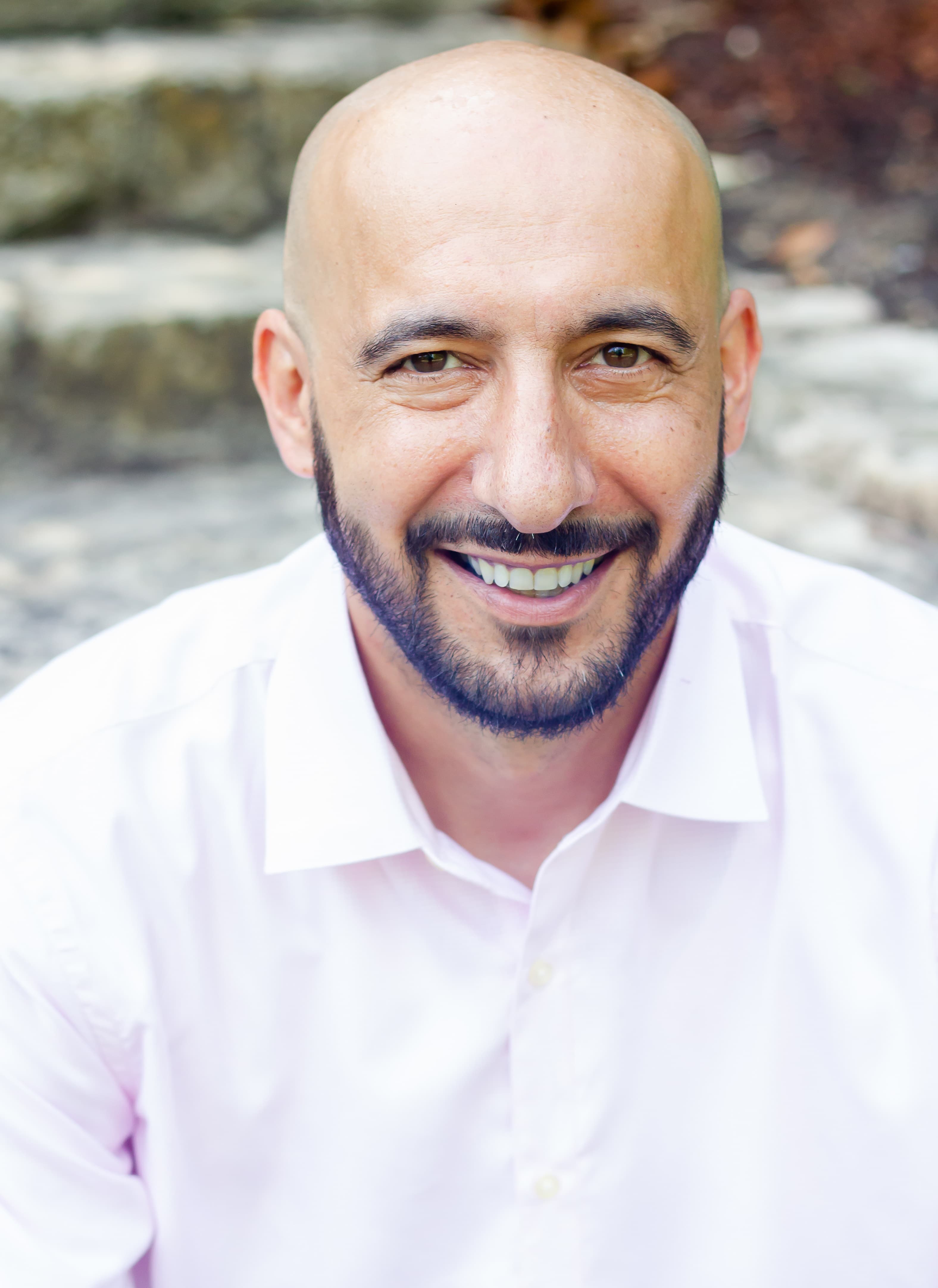 Portrait of Amin Rad, Principal / Designated Broker
